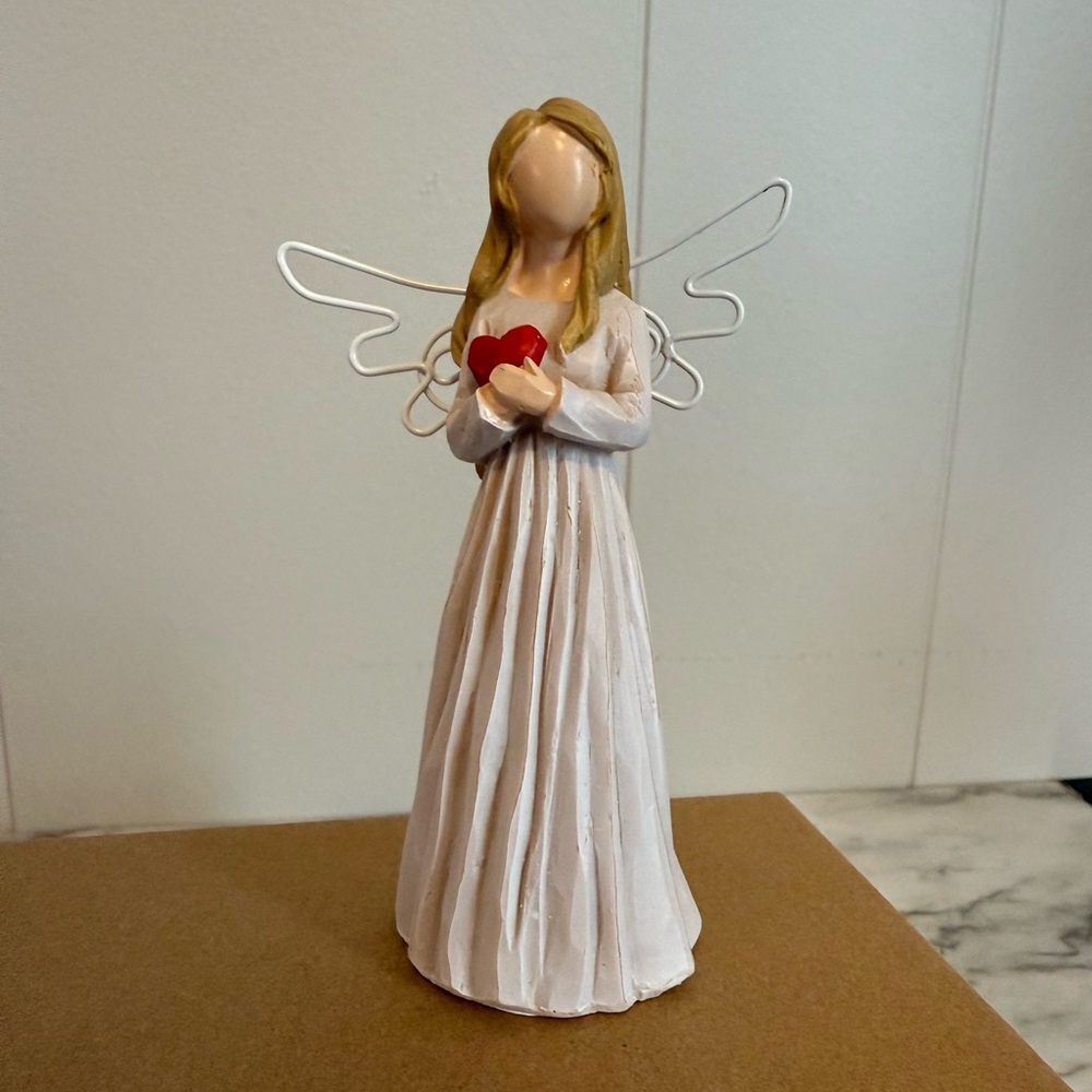 Angel Figurine holding a heart